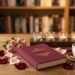 A romance novel, coffee, rose petals, and five glowing candles on a warm bookshelf backdrop.